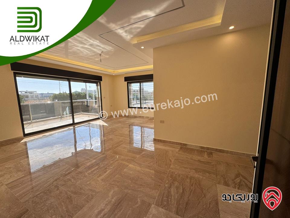 شقة ارضية معلقة للبيع في عمان - خلدا العوجانية المساحة 220م ترس 15م موقع مميز