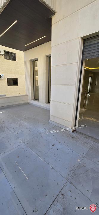 شقة مميزة طابق أرضي دوبلكس مساحة 287م داخلي و 240م خارجي للبيع في عمان - الجندويل