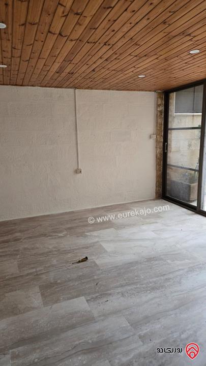 شقة شبه ارضية مساحة 200م داخلي و 100م خارجي للايجار في عمان - خلدا 