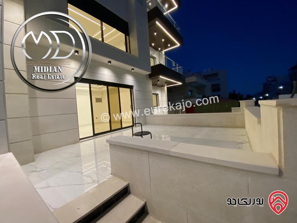 شقق شبه ارضي جديدة للبيع في عمان - الجاردنز مساحات 235م & 275م مع تراسات و حدائق تشطيبات ديكورات عصرية فاخرة