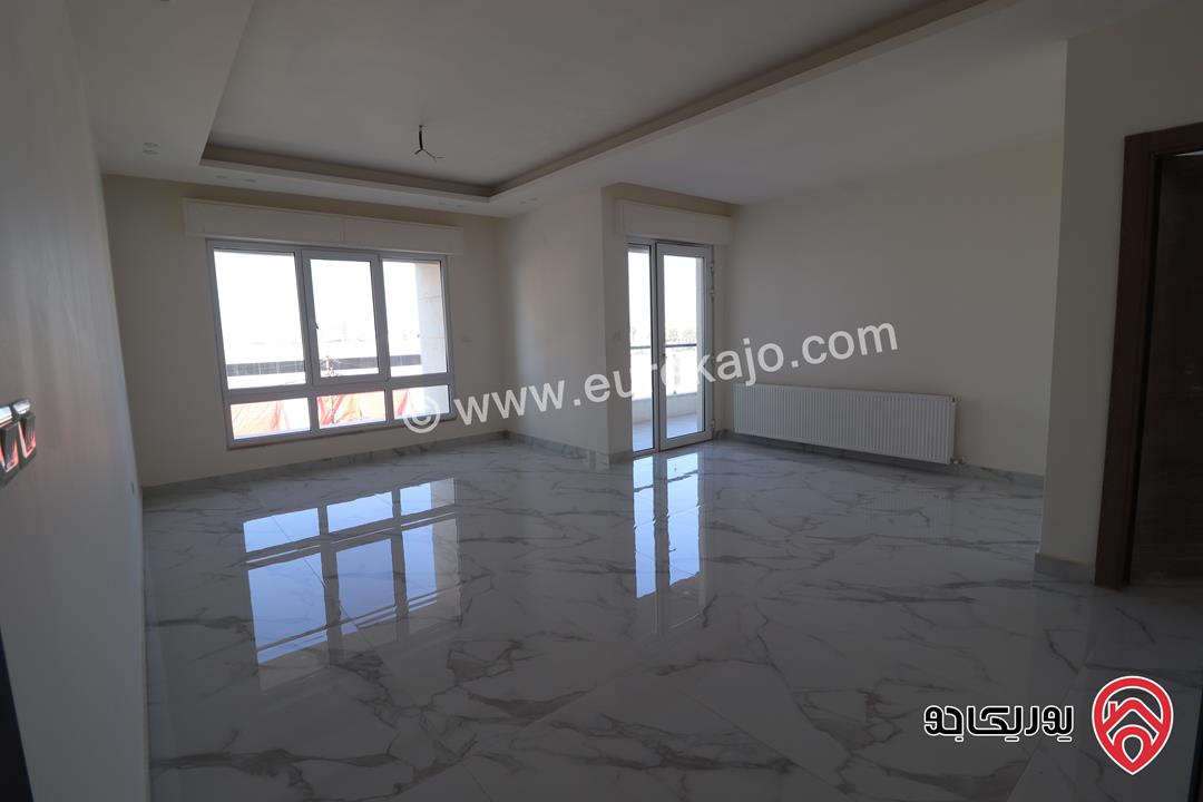 شقة جديدة 183م طابق ثالث للبيع في عمان - خلدا بإطلالة رائعة وموقع هادئ