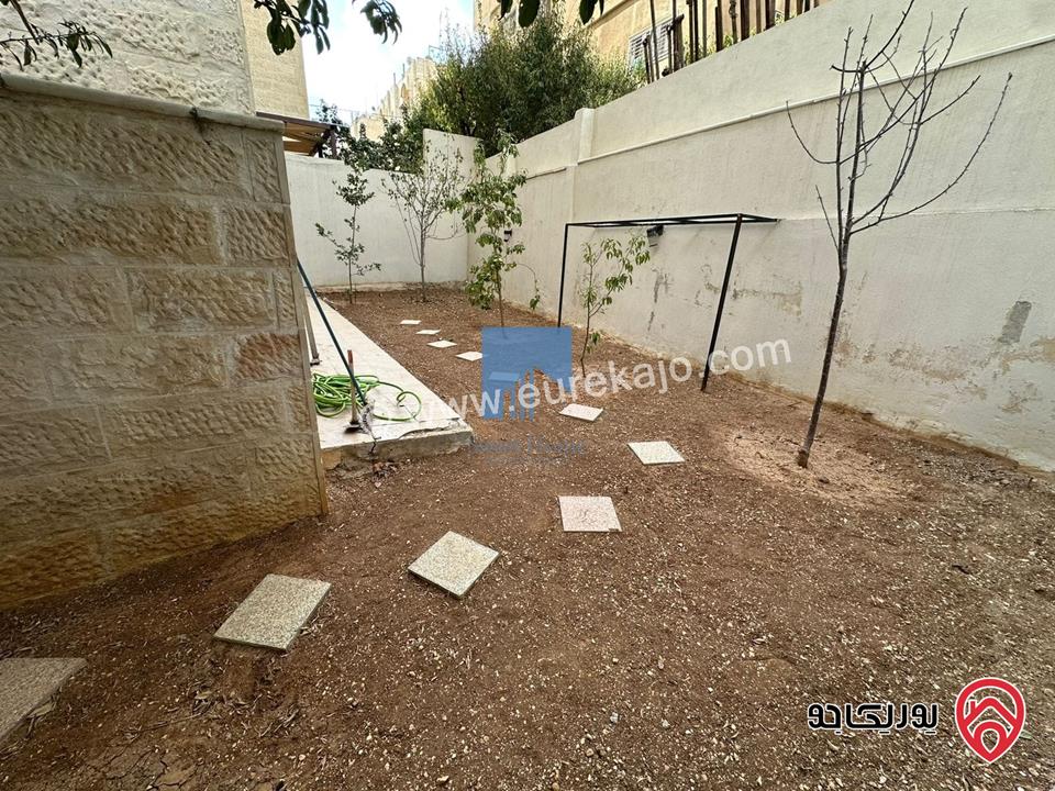 شقة أرضية مميزة للبيع في عمان - الجندويل قرب مركز أمن البيادر 180م مع حديقة وترسات 200م