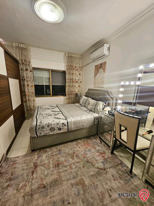 شقه طابق ارضي مساحة 150م مع حديقة 100م للبيع في عمان - الرابية 