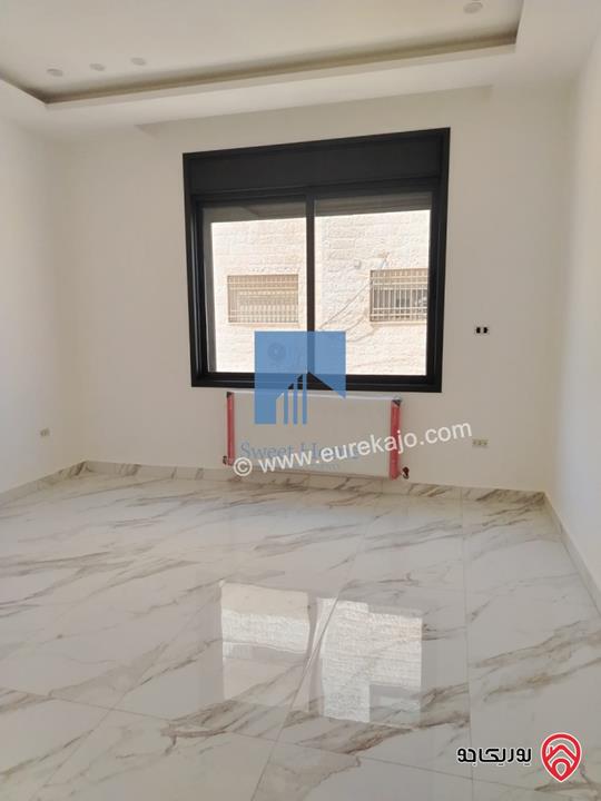 شقة فاخرة للبيع في عمان - خلدا خلف المستشفى السعودي ومقابل ميداس طابق ثالث 180م مع روف دوبلكس 130م لم تسكن