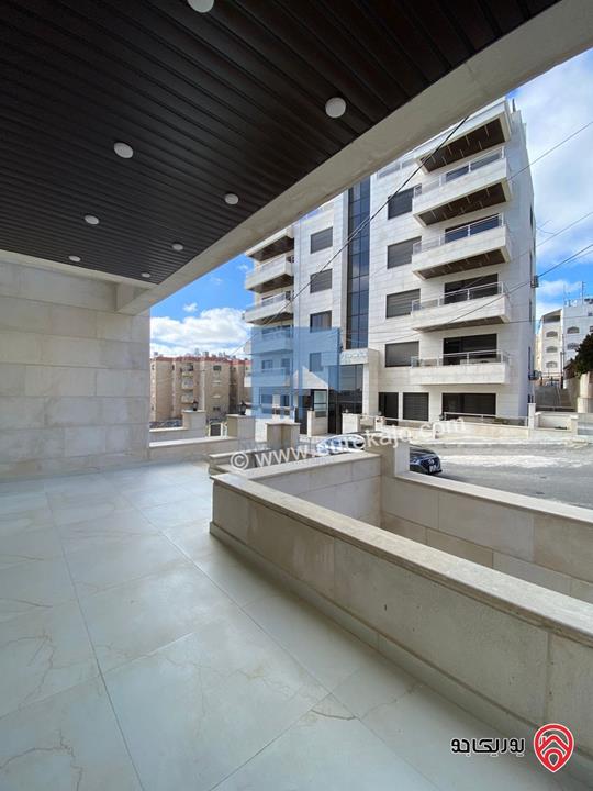 شقة فاخرة أرضية 184م مع ترس امامي 30م تشطيب سوبر ديلوكس لم تسكن للبيع في عمان - تلاع العلي