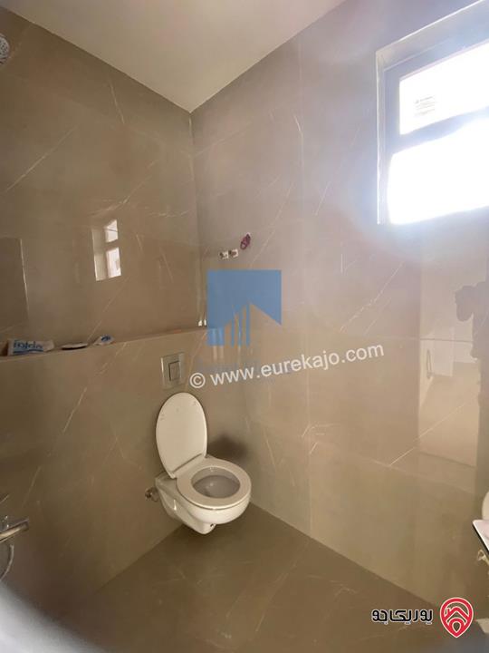 شقة فاخرة للبيع في عمان - أم أذينة قرب أبراج السادس طابق ثالث 180م مع روف دوبلكس 105م لم تسكن