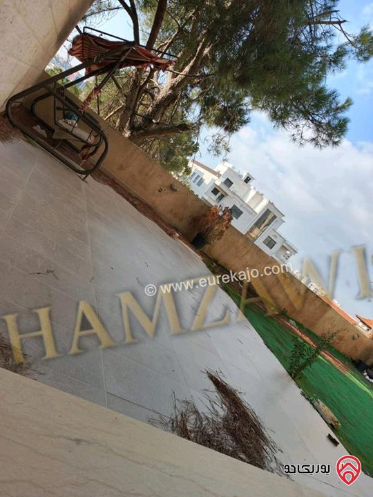 شقة مميزة شبه ارضية مساحة 200م داخلي و 120م خارجي للايجار في عمان - حي الصحابة 