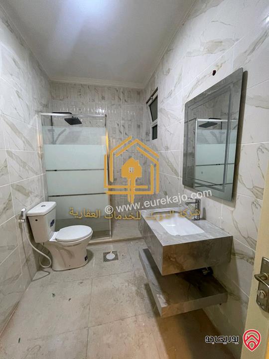 شقة فارغة طابق تسوية مساحة 90م للإيجار في عمان - دير غبار 