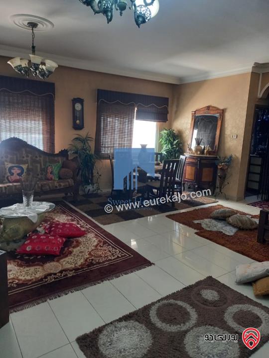 شقة أرضية مساحة 130م مع حديقة وترسات 140م للبيع في عمان - خلدا