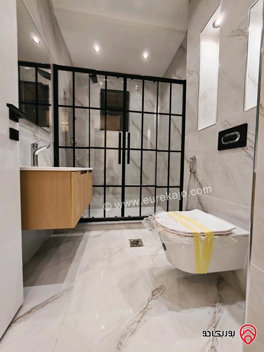 شقة طابق ارضي مساحة 225م مع ترسات 100م وكراج خاص للبيع في عمان - شفا بدران 