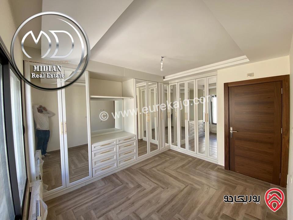 شقة دوبلكس جديدة فارغة للايجار في عمان - ضاحية النخيل طابق اخير مع روف مساحة 250م مع تراسات تشطيبات و ديكورات عصرية فاخرة