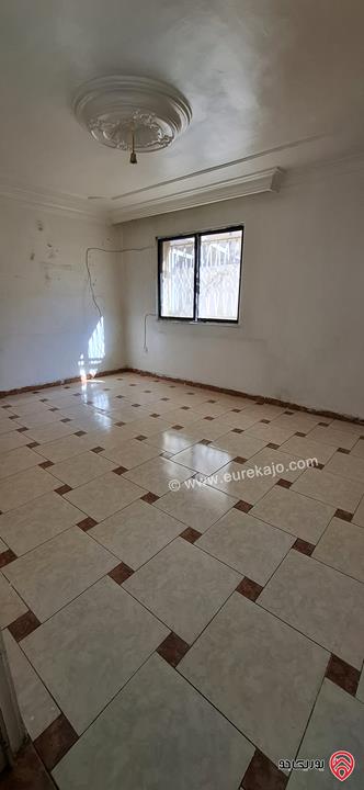 شقة طابق أرضي مساحة 100م داخلي و 80م خارجي للبيع في عمان - طبربور