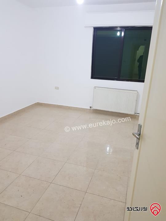 شقة ارضية مساحة 130 م مع ترس امامي 25م وكراج خاص للايجار في عمان - تلاع العلي 