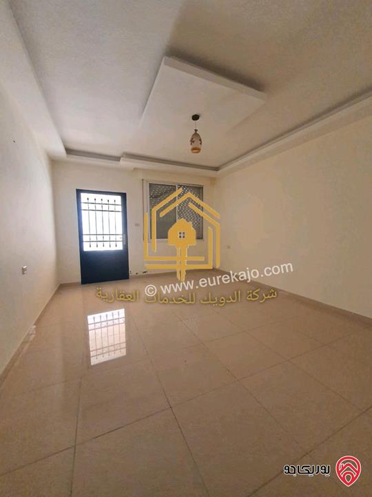 شقة فارغة طابق ارضي مساحة 150م داخلي مع 50م ترس للإيجار في عمان - ضاحية الأقصى 