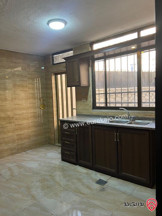 شقة أرضية مساحة 115م داخلي و 85م خارجي للببع في عمان - ضاحية الأمير حسن