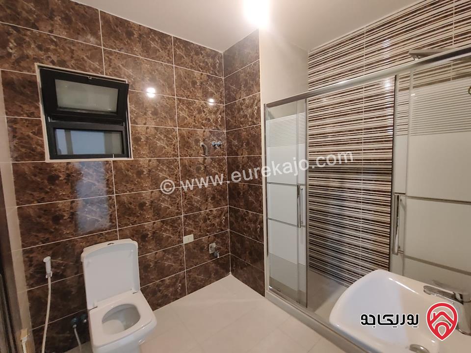 شقة ارضية مساحة 135م للبيع في عمان - جبل الزهور          	 