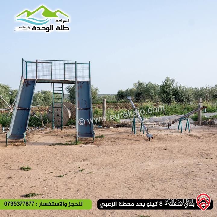 قطعة أرض مساحة 8 دونم مقام عليها استراحة طلة الوحدة - للبيع في شمال اربد مطل على سد الوحدة و جنوب سوريا 
