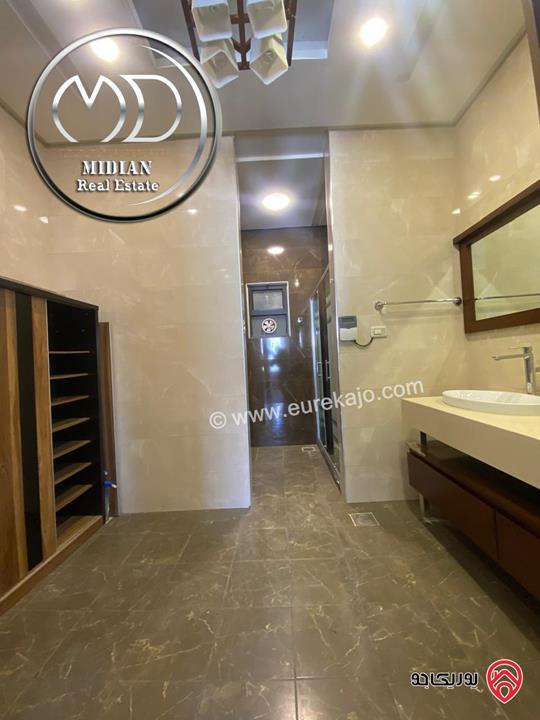 شقة للبيع طابق أخير مع روف في عمان - خلدا - العوجانية مساحة 425م مع تراسات تشطيبات ديكورات فاخرة اطلالة بانورامية خلابة 