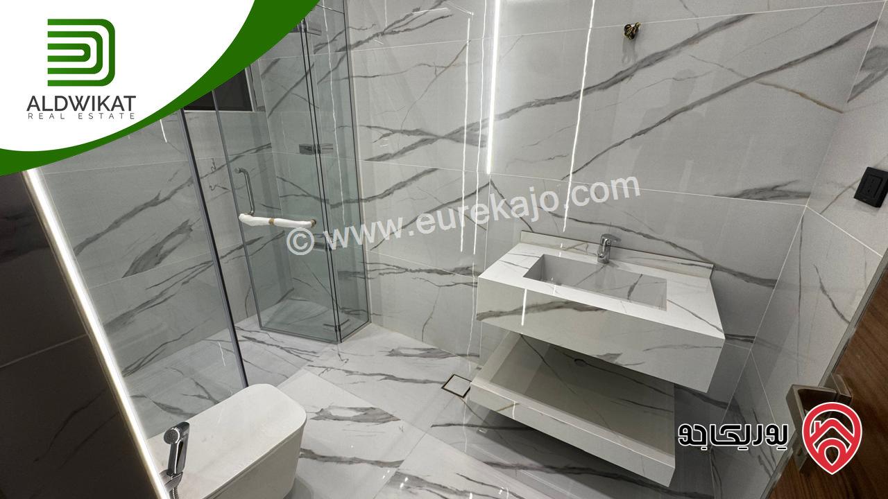 شقة ارضية للبيع في عمان - خلدا مساحة البناء 250 م والترس 80م موقع مميز واطلالة