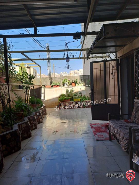 شقة طابق شبه ارضي مساحة 143م داخلي و 50م خارجي للبيع في عمان - أم نوارة