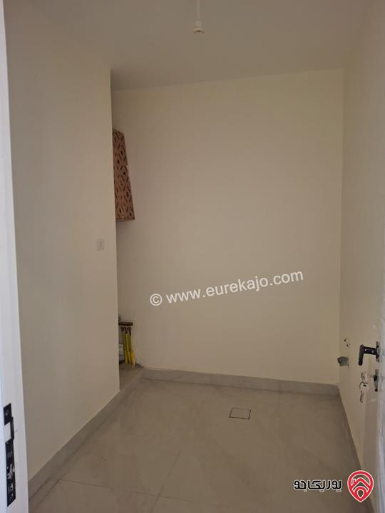 شقة جديدة طابق أول مساحة 175م للبيع في عمان - الرابية