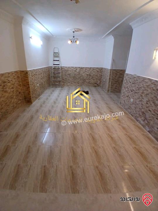 شقة فارغة طابق شبه ارضي مساحة 100م مع ترس 20م للإيجار في عمان - تلاع العلي 