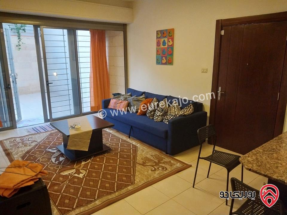 شقه للايجار في عمان - الدوار السابع مساحة 80م + 130م شبه ارضي قرب الترخيص