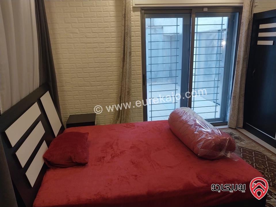 شقه للايجار في عمان - الدوار السابع مساحة 80م + 130م شبه ارضي قرب الترخيص