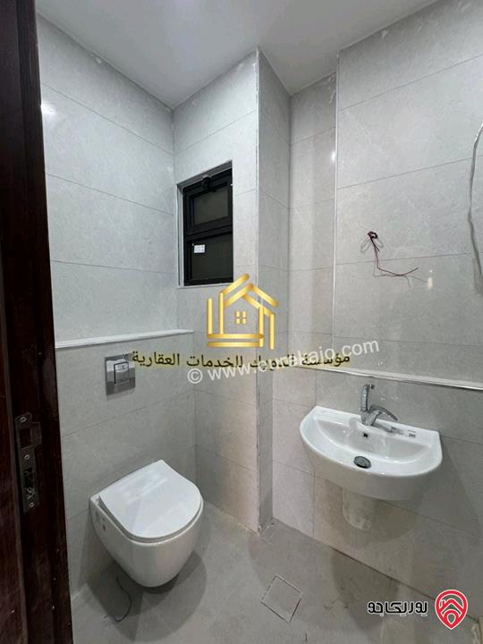 شقة جديدة لم تسكن طابق ارضي مساحة 125م للإيجار في عمان - مرج الحمام 