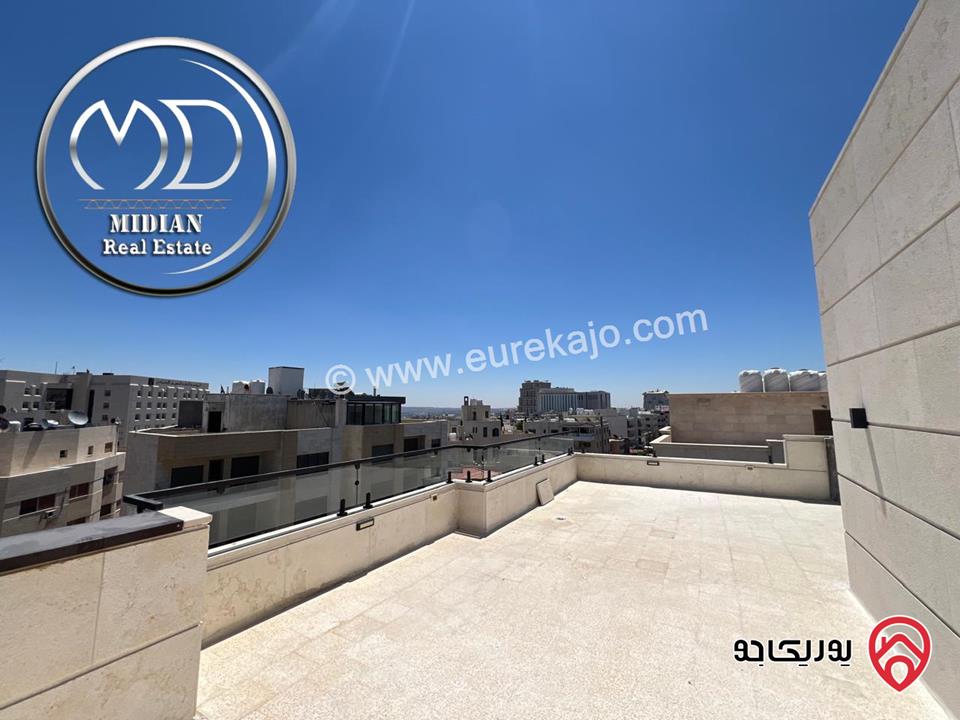 شقة دوبلكس جديدة طابق اخير مع روف للبيع في عمان - ام اذينة مساحة 200م مع تراسات تشطيبات و ديكورات عصرية فاخرة