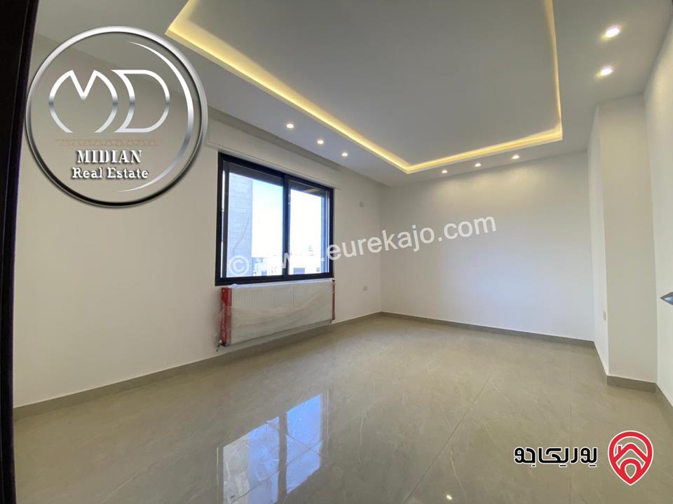 شقق أرضية جديدة للبيع في عمان - خلدا مساحات 140م & 145م مع تراسات و حدائق تشطيبات ديكورات سوبر ديلوكس بسعر مميز