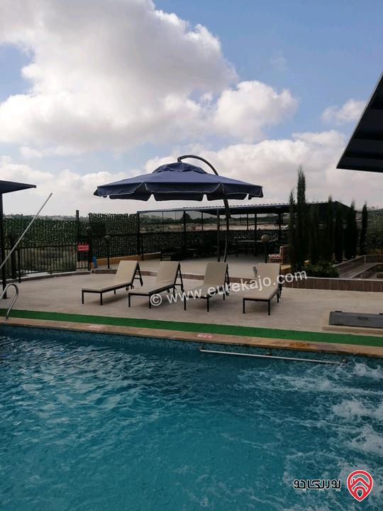 مزرعة ومنتجع مساحة الأرض 3 دونم و 700م والبناء 250م للبيع في اربد - كفر سوم قوشان مستقل استثمارية وسكنية