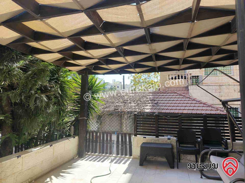 شقة طابق أرضي مساحة 173م مع ترس 60م مفروشة للبيع في عمان - الرابية