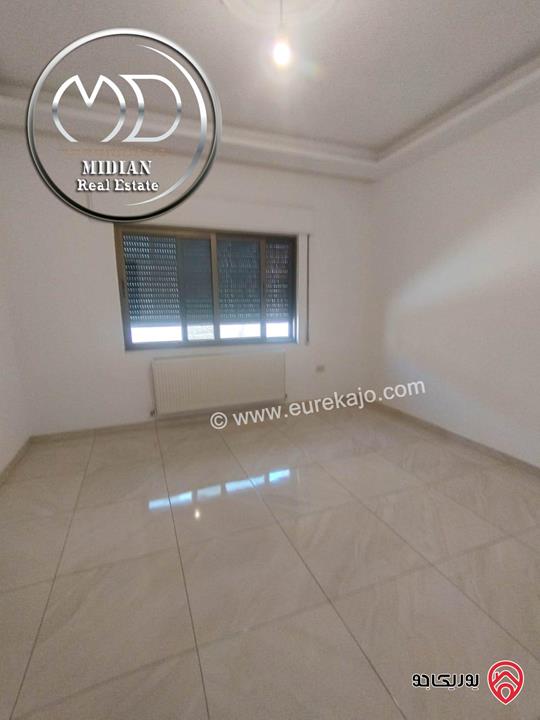 شقة شبه ارضي للبيع في عمان - ضاحية النخيل مساحة 210م مع ترس و حديقة 100م جديدة لم تسكن بسعر مميز