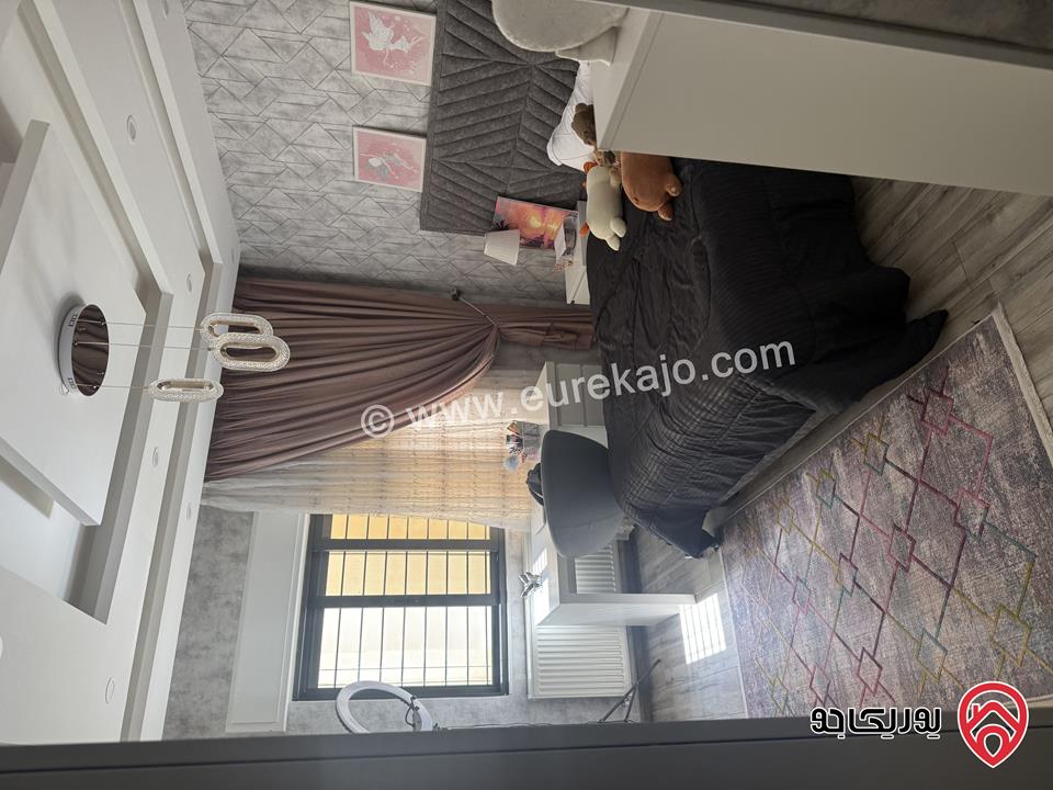 شقة ديلوكس أرضية مساحة 210م داخلي و 120م خارجي للبيع مفروشة في عمان - تلاع العلي