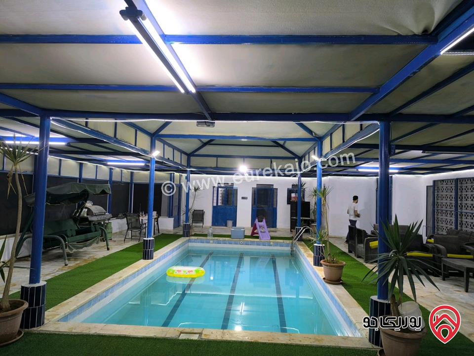 مزرعة مساحة 2 دونم مزروعة حمضيات وتمر وزيتون  مع مسبح مع شاليه عدد 2 للبيع في الشونة الجنوبية