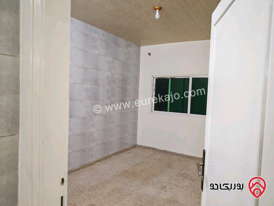 شقة طابق أول مساحة 87م للايجار في اربد غرب نفق الجامعة 