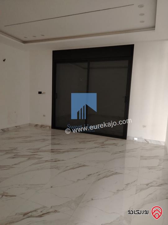 شقة فاخرة للبيع في عمان خلدا  - خلف المستشفى السعودي ومقابل ميداس طابق ثاني 217م لم تسكن بسعر مغري