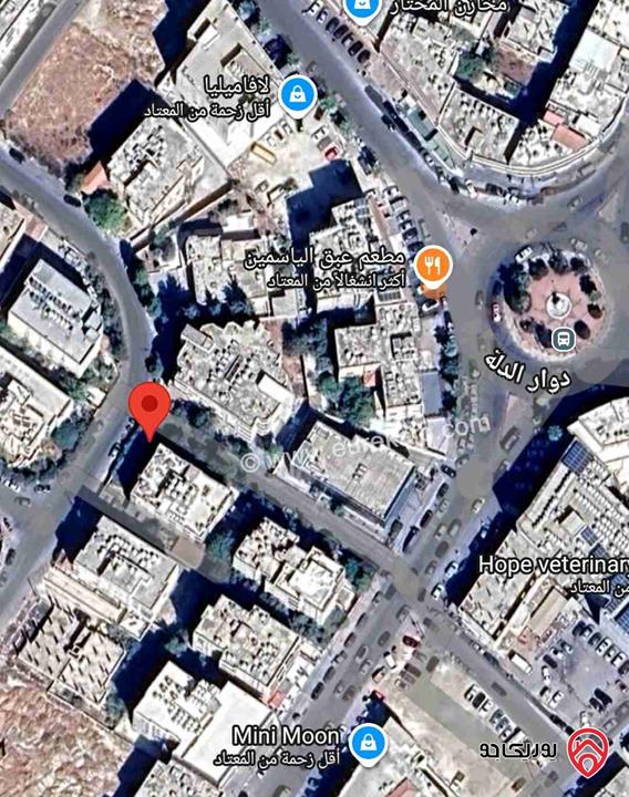 أرض مساحة 1100م على شارعين تجاري طولي ضمن سكن أ للبيع في عمان - مرج الحمام