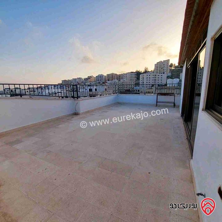 شقة طابق اخير مع روف مساحة 183م للبيع في عمان - خلدا