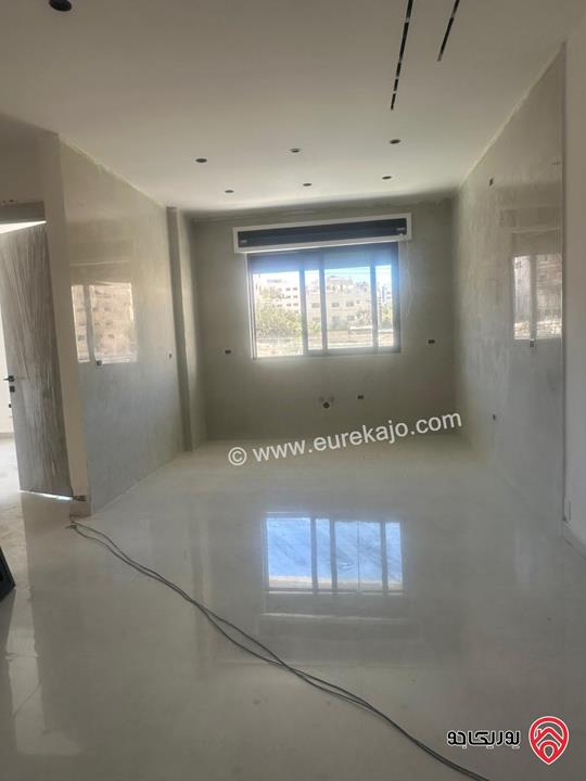 شقة مساحة 100م طابق أول للبيع في عمان - البنيات قرب مدارس الحصاد