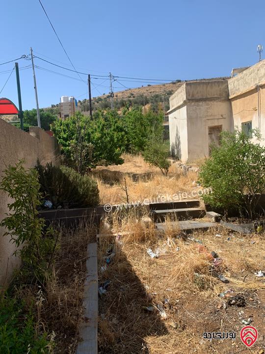 أرض مساحة 1 دونم على شارعين للبيع في الزرقاء - أم رمانة