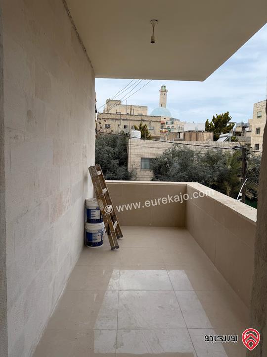 شقة طابق أول مساحة 128م للبيع في عمان - الجبل الأخضر حي نزال الشمالي 