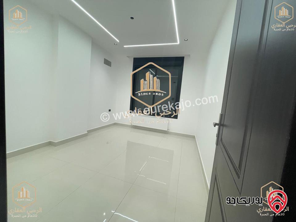 شقة ارضية مساحة 145م مع ترس خارجي 135م للايجار في عمان - الجندويل