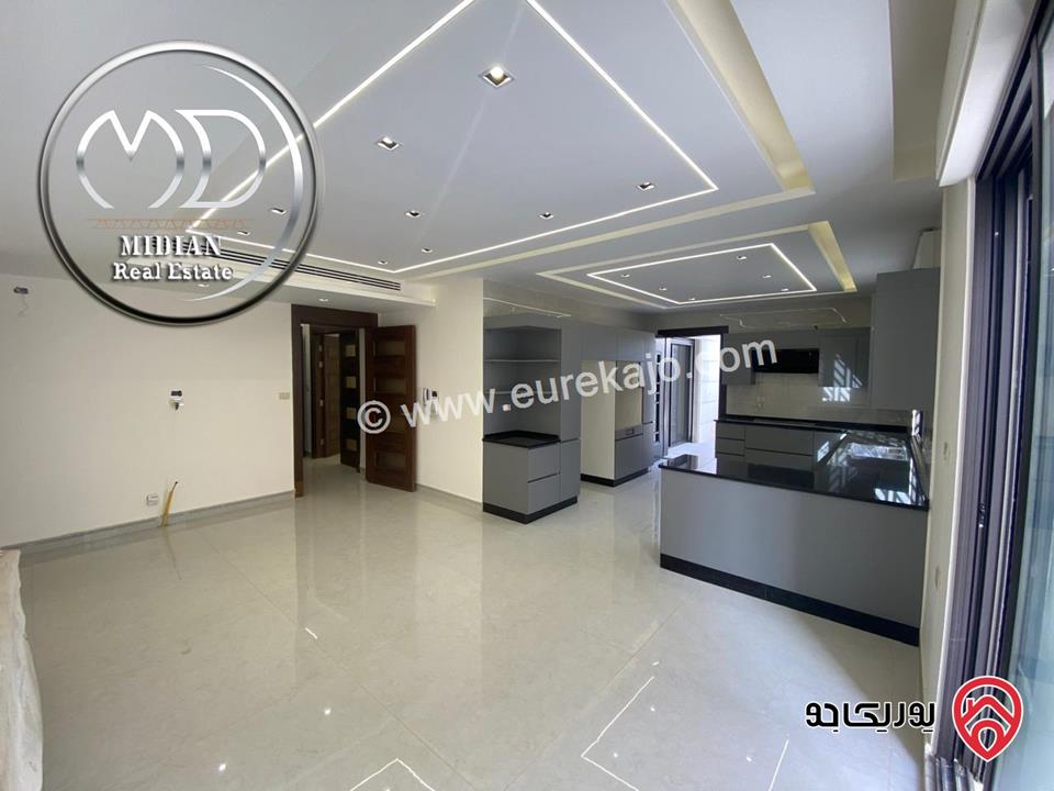 شقة جديدة شبه ارضي فارغة للايجار في عمان - دابوق مساحة 200م مع تراسات 150م تشطيبات وديكورات عصرية فاخرة