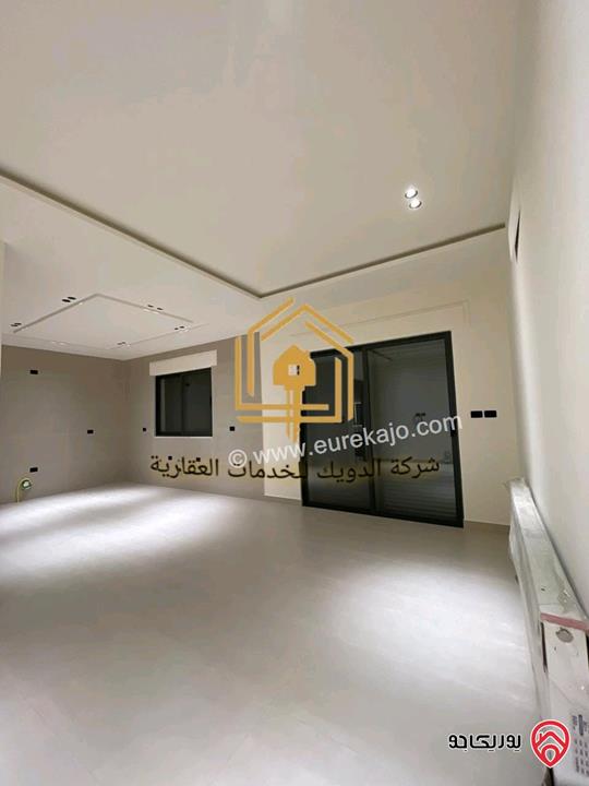 شقة جديدة طابق أرضي مساحة 165م داخلي و 180م خارجي للايجار في عمان - حي الصحابة 