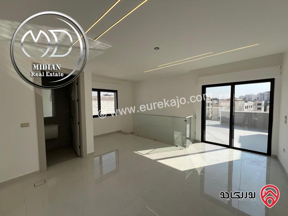 شقة دوبلكس جديدة طابق أخبر مع روف للبيع في عمان - حي الصحابة مساحة 215م مع تراسات اطلالة رائعة بسعر مميز