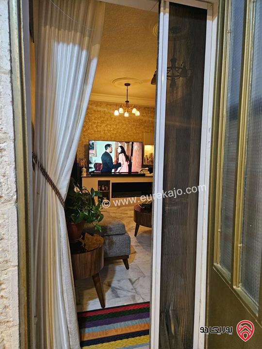 شقه طابق ارضي مساحة 150م مع حديقة 100م للبيع في عمان - الرابية 