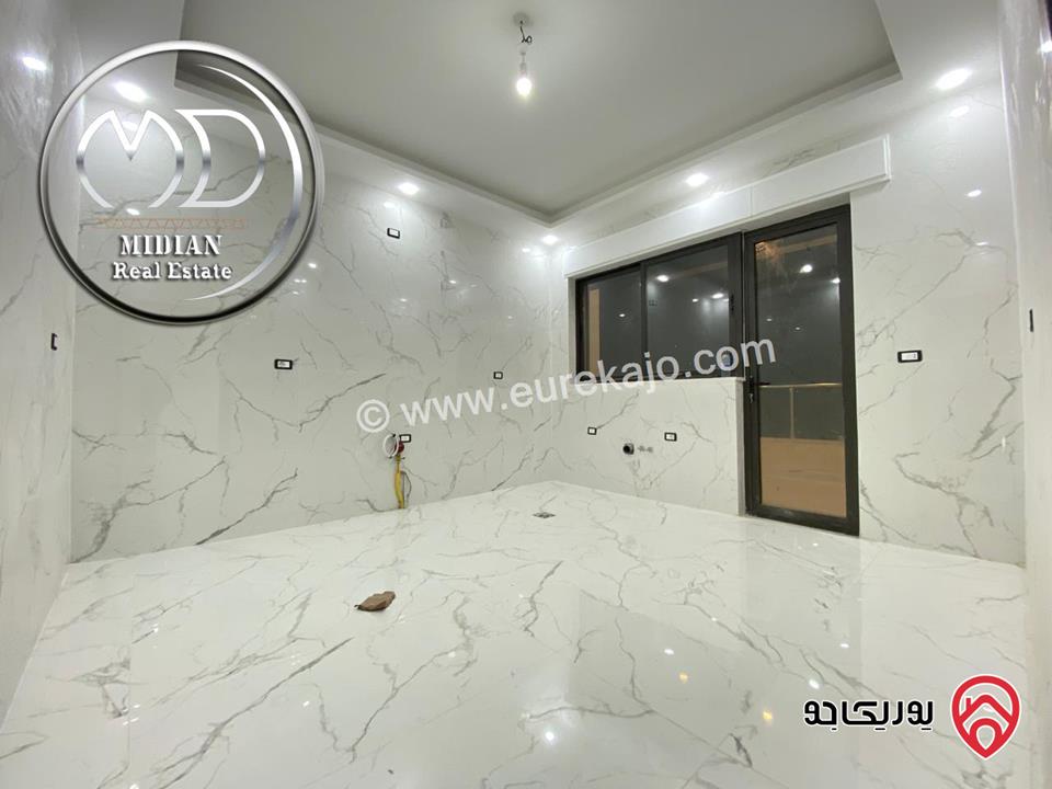 شقق ارضية جديدة للبيع في عمان - الرابية مساحات 175م & 180م تشطيبات ديكورات سوبر ديلوكس بأسعار مميزة