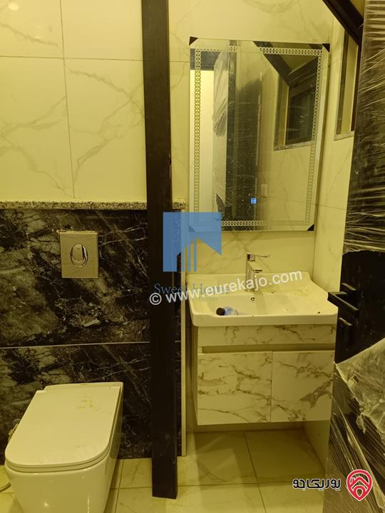 شقة فاخرة للبيع في عمان - الجندويل - قرب لارسا ومقابل شركة زين طابق اول 115م تشطيب سوبر ديلوكس لم تسكن